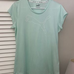 turquoise puma athletic shirt in excellent condition never worn
